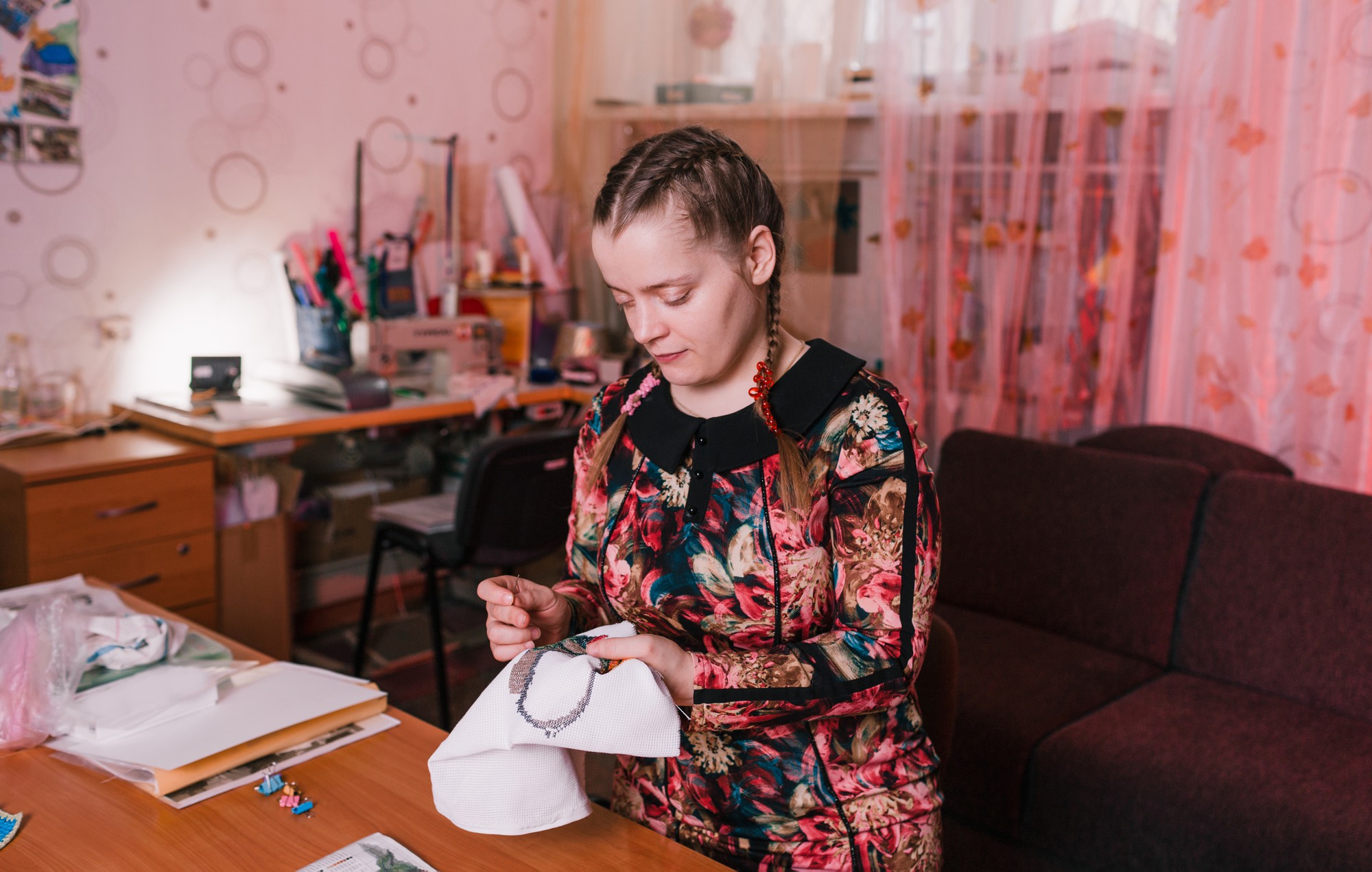 portrait of lead embroiderer at work